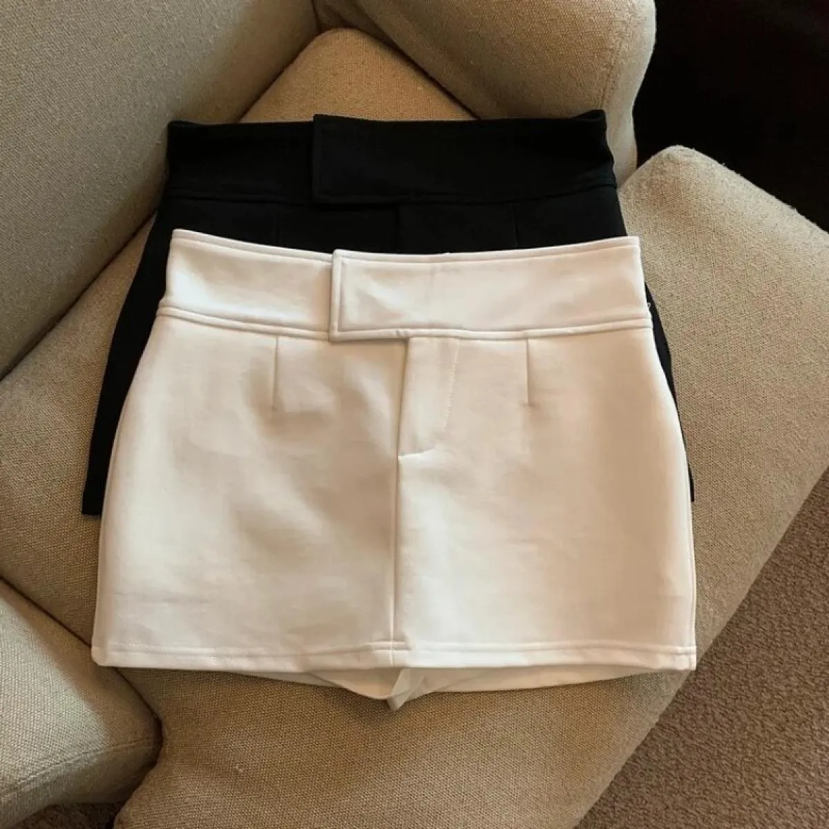 Pantaloncini bianchi Femeninas Faldas Mujer Moda Wild A Line Wrap Hip Shorts Gonne Primavera Estate Suit Casual Mini Ol Temperam